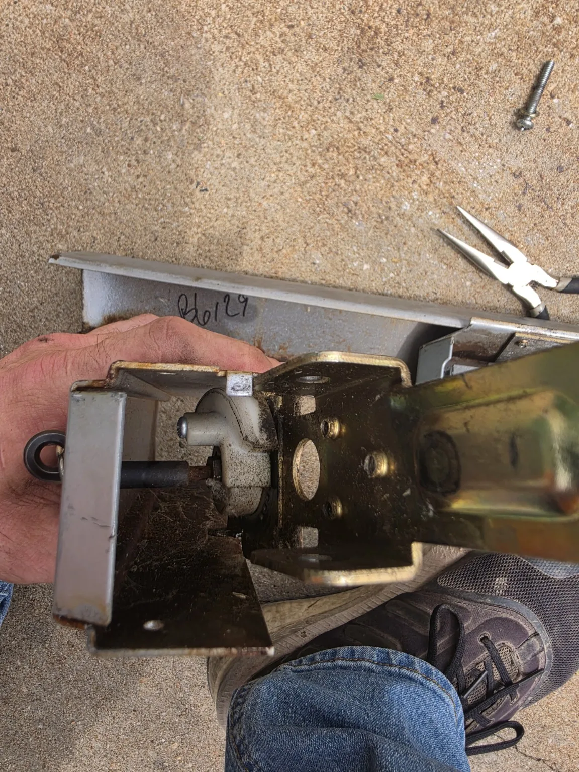 Commercial door mechanism opened for diagnosis