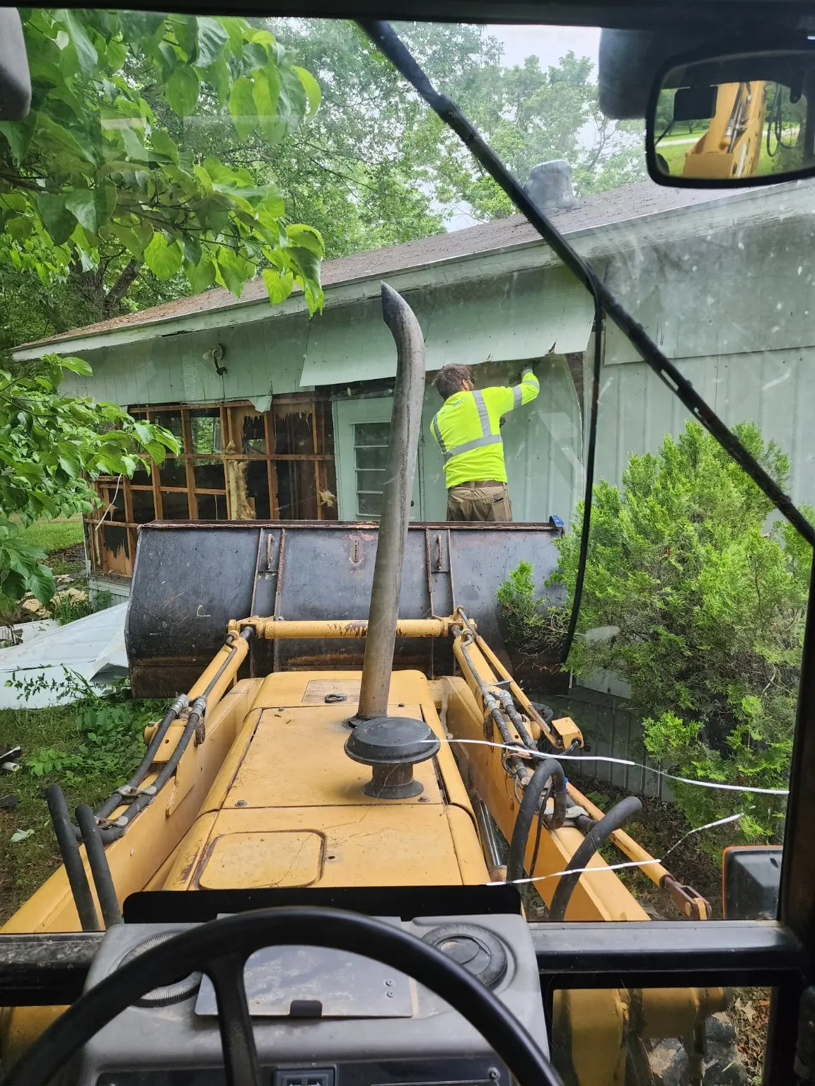 House demolition work with equipment and hired help